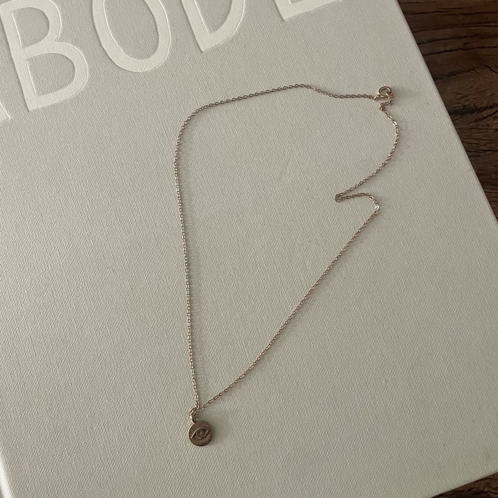 Gold eye necklace. Cute and dainty.